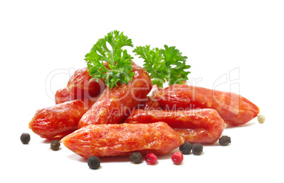 Salami with pepper on white background