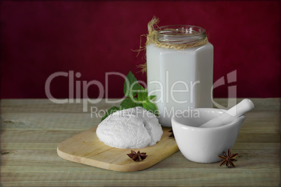 Still life with cheese and milk