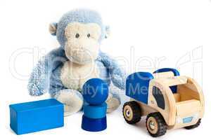 Toy monkey and bricks