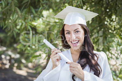 Graduating Mixed Race Girl In Cap and Gown with Diploma