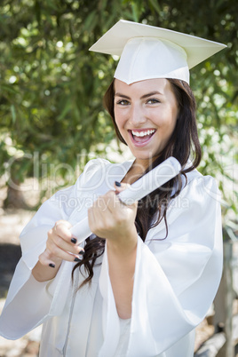 Graduating Mixed Race Girl In Cap and Gown with Diploma