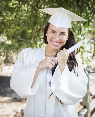 Graduating Mixed Race Girl In Cap and Gown with Diploma