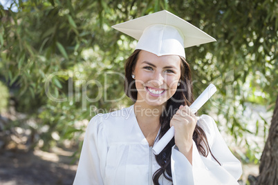 Graduating Mixed Race Girl In Cap and Gown with Diploma