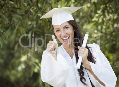 Graduating Mixed Race Girl In Cap and Gown with Diploma