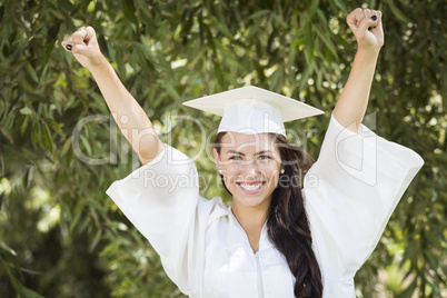 Happy Graduating Mixed Race Girl In Cap and Gown