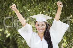 Happy Graduating Mixed Race Girl In Cap and Gown
