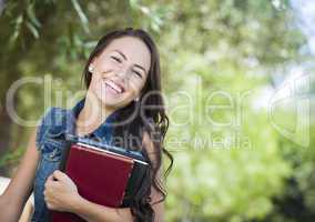 Mixed Race Young Girl Student with School Books