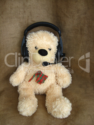 Toy bear in headphones