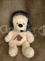 Toy bear in headphones