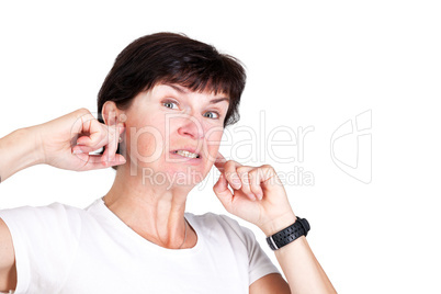 Woman holding his ears