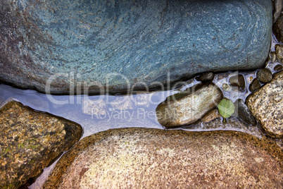 Body of water between stones