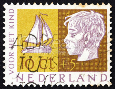 Postage stamp Netherlands 1953 Head of Child and Sailboat