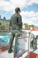 Boating in Lugano - Man driving a boat on a lake in Lugano, Swit