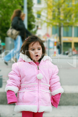 portrait young girl walking in winter park