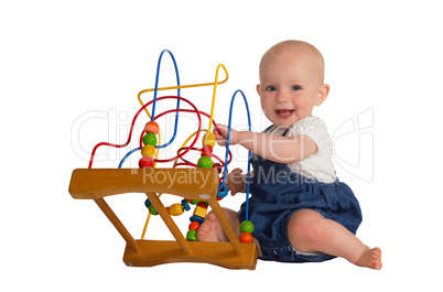 Happy baby with educational toy