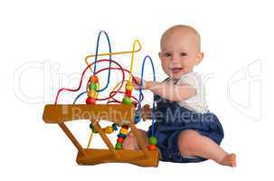 Happy baby with educational toy