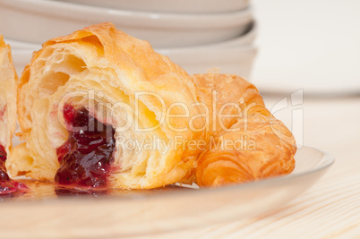 croissant French brioche filled with berries jam