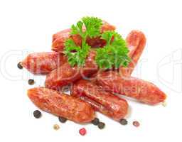 Salami with pepper on white background