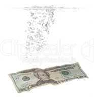 bubbles and Dollar banknote in water