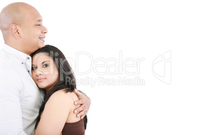 Young loving couple - isolated over a white background