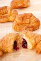croissant French brioche filled with berries jam