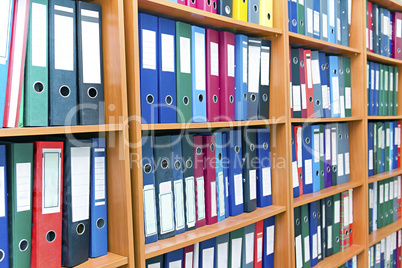 file folders, standing on the shelves