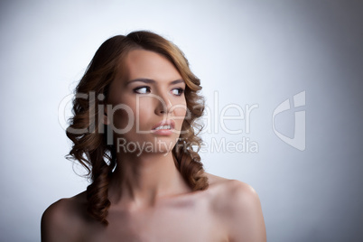 Scared young woman looking away