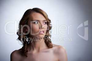 Scared young woman looking away