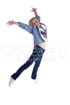 Happy girl in jeans jumping