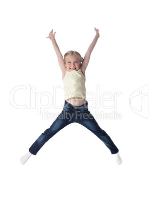 Happy blonde girl in jeans jumping