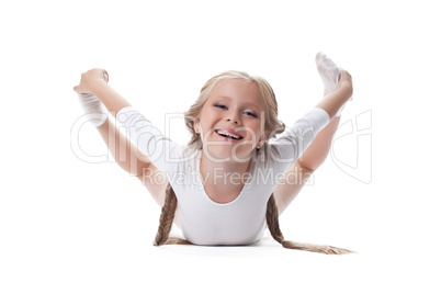 Happy girl performing gymnastic exercises