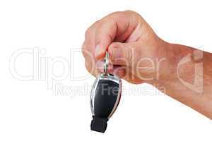 Hand holding car keys