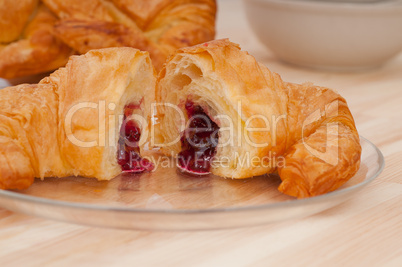 croissant French brioche filled with berries jam