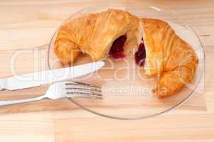 croissant French brioche filled with berries jam