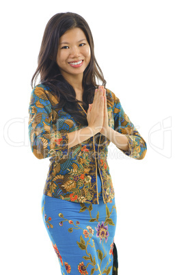 Asian woman gestures welcoming