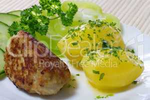 Boiled potatoes with hamburger and vegetables