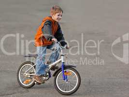 Child with bicycle