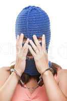 Woman in balaclava hiding face