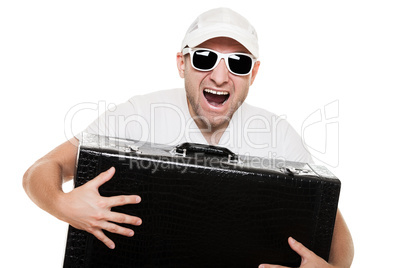 Man holding suitcase in hands
