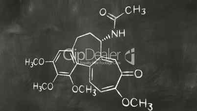 drawing chemical formula on chalkboard