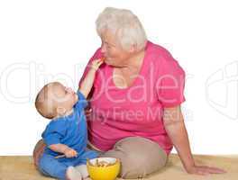 Tender moment between baby and grandmother