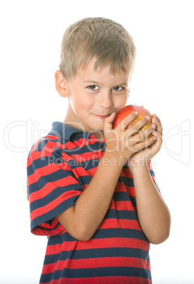 Boy holding an apple