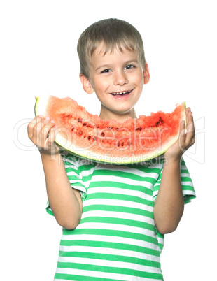 Boy holding a watermelon