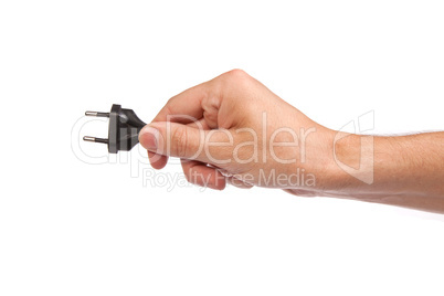 Man is holding a black outlet in the hand