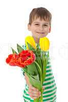 Young boy holding tulips