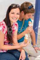 Young woman and man with ice cream