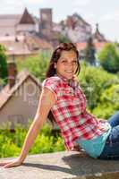 Young woman visit city sightseeing smiling posing