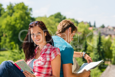 Young woman hold map visit tourist destination