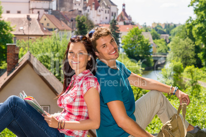 Young happy couple visit city holiday trip