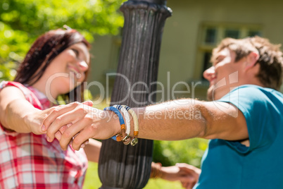 Playful couple having fun in the park